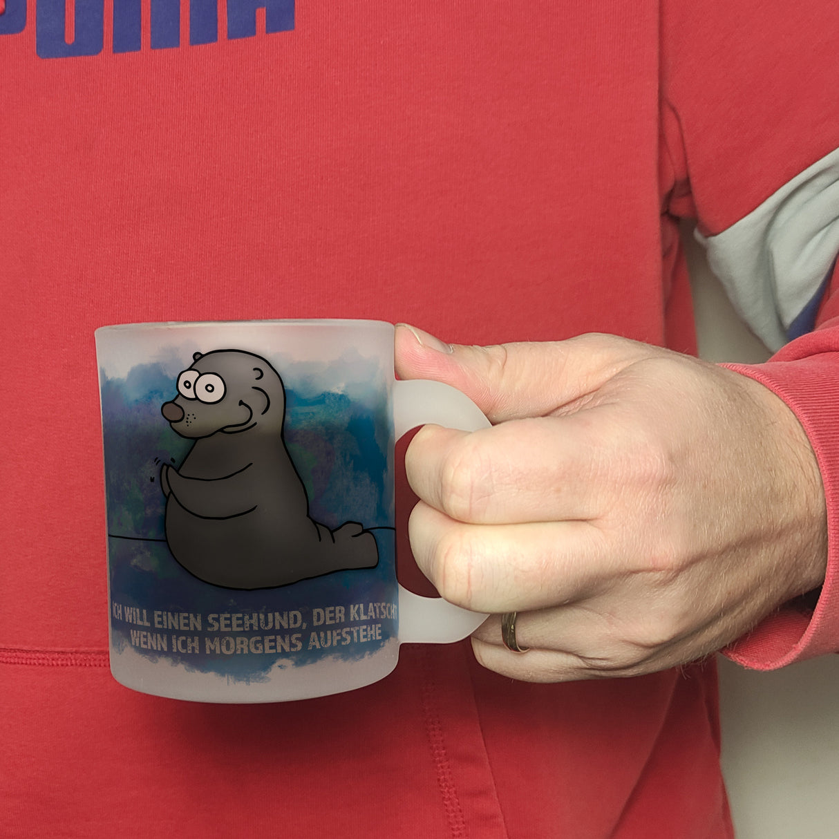 Kaffeebecher mit Seehund Motiv und Spruch: Ich will einen Seehund, der klatscht, ...