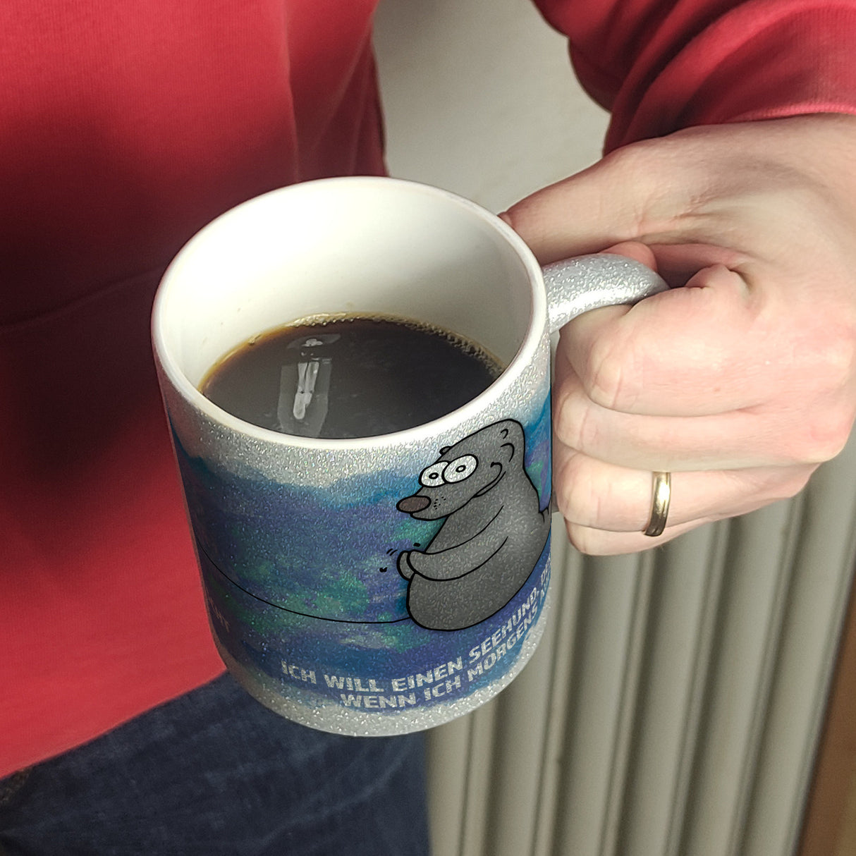 Kaffeebecher mit Seehund Motiv und Spruch: Ich will einen Seehund, der klatscht, ...