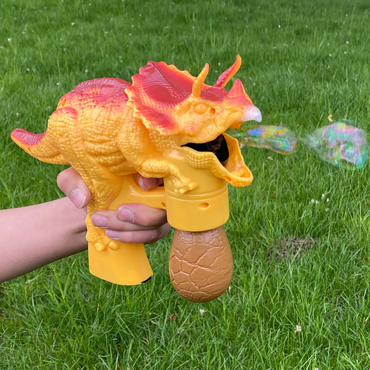 Triceratops Seifenblasenpistole mit Licht, Sound und Seifenlauge
