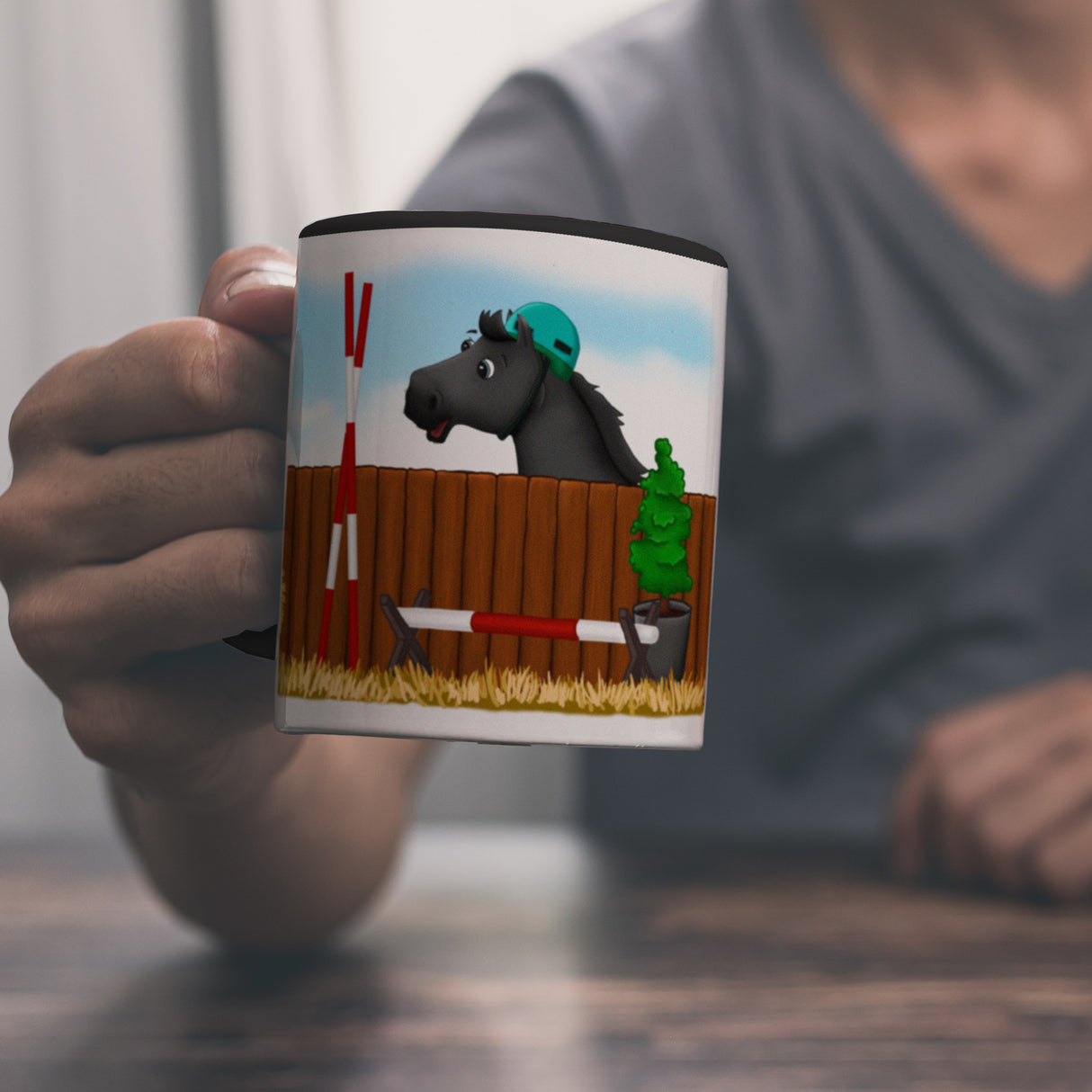 Kaffeebecher mit schwarzes Springpferd Motiv