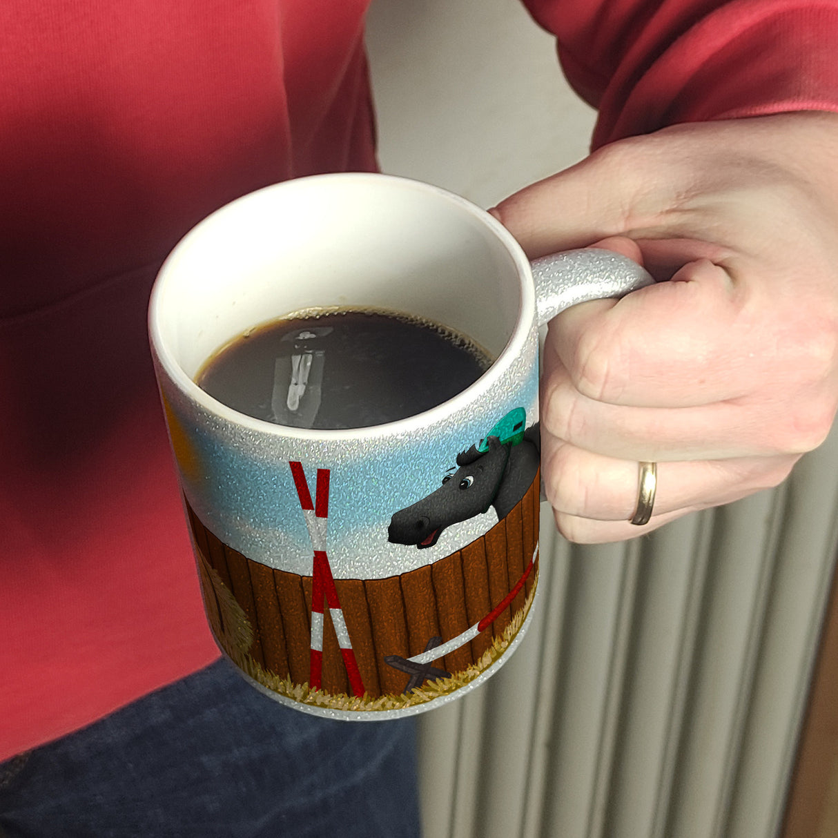 Kaffeebecher mit schwarzes Springpferd Motiv