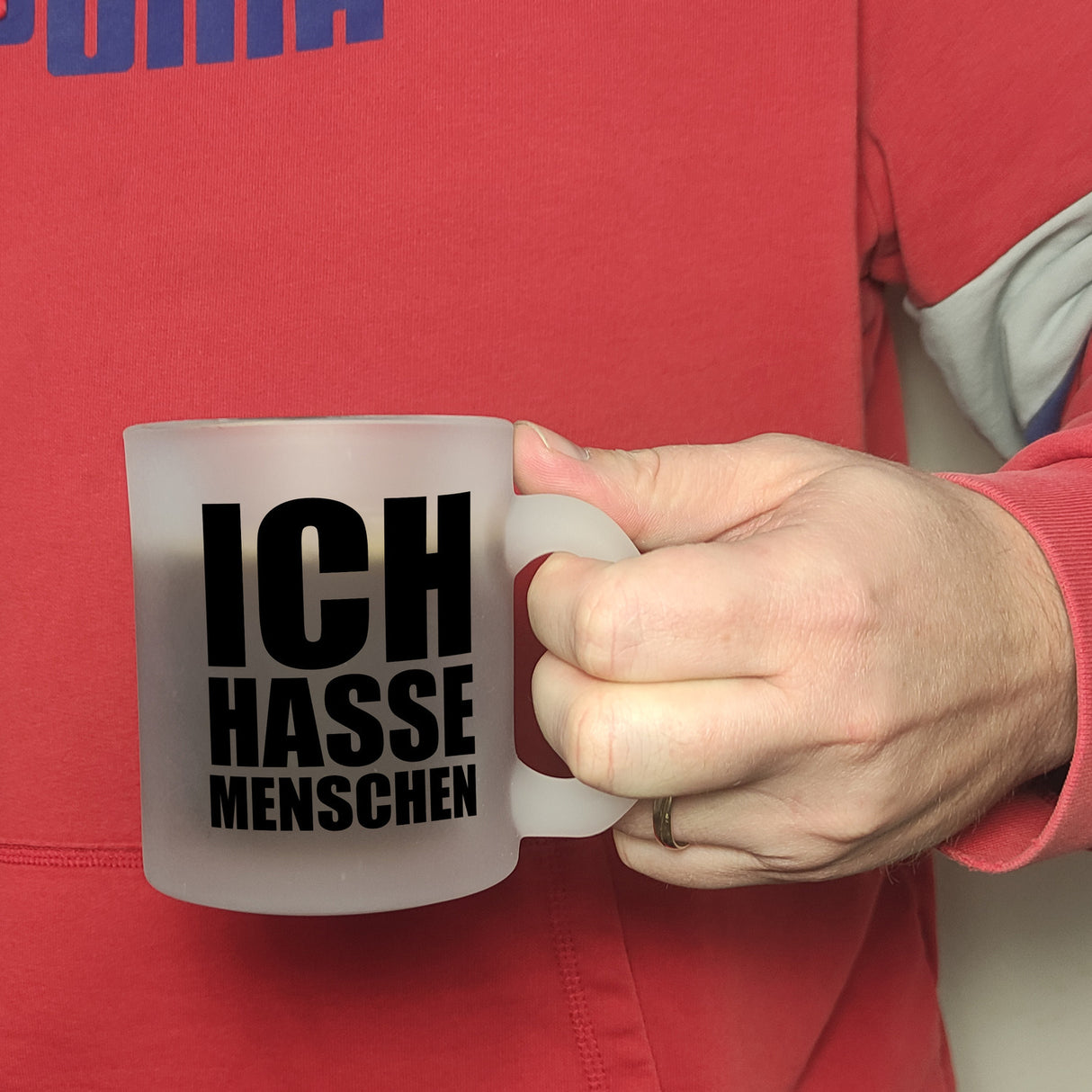 Kaffeebecher mit Mittelfinger Motiv und Spruch: Ich hasse Menschen