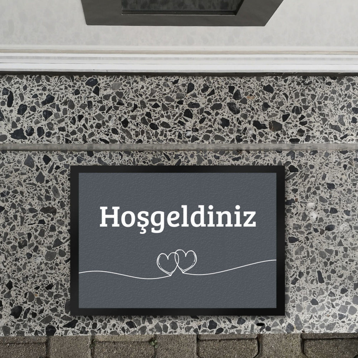 Fußmatte Willkommen in dunkelgrau mit Herzen