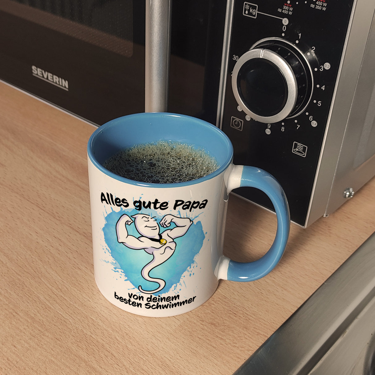 Papas bester Schwimmer Kaffeebecher mit Samen Illustration