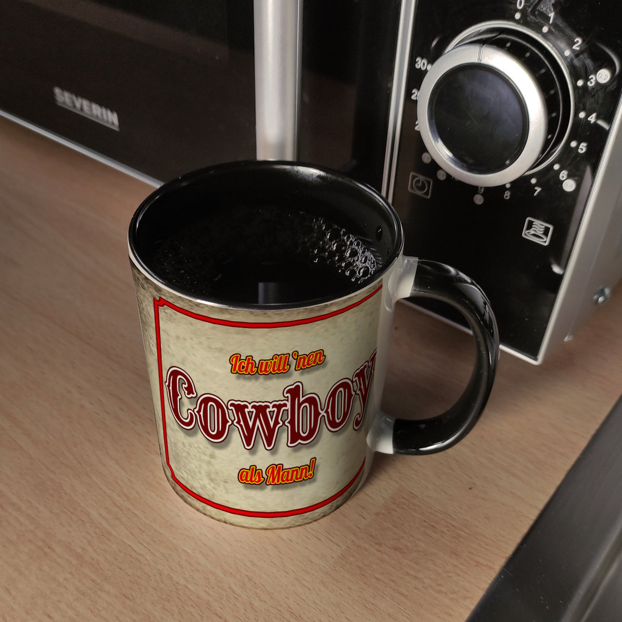 Kaffeebecher mit sexy Cowboy und Spruch - Ich will 'nen Cowboy als Mann