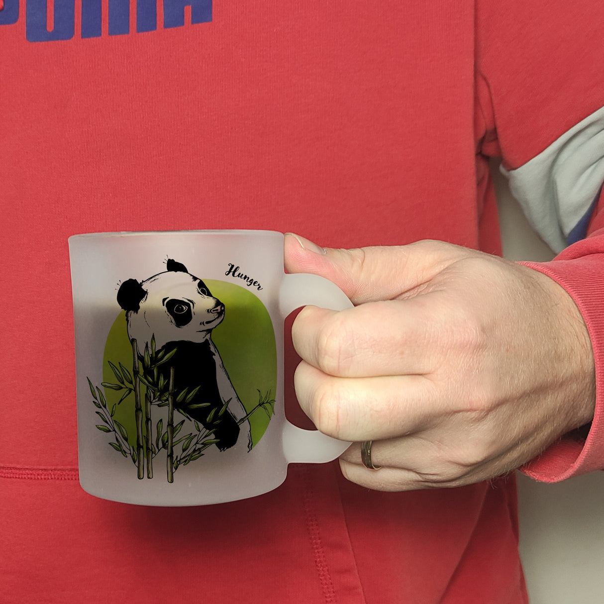 Panda mit Bambus Kaffeebecher und grün