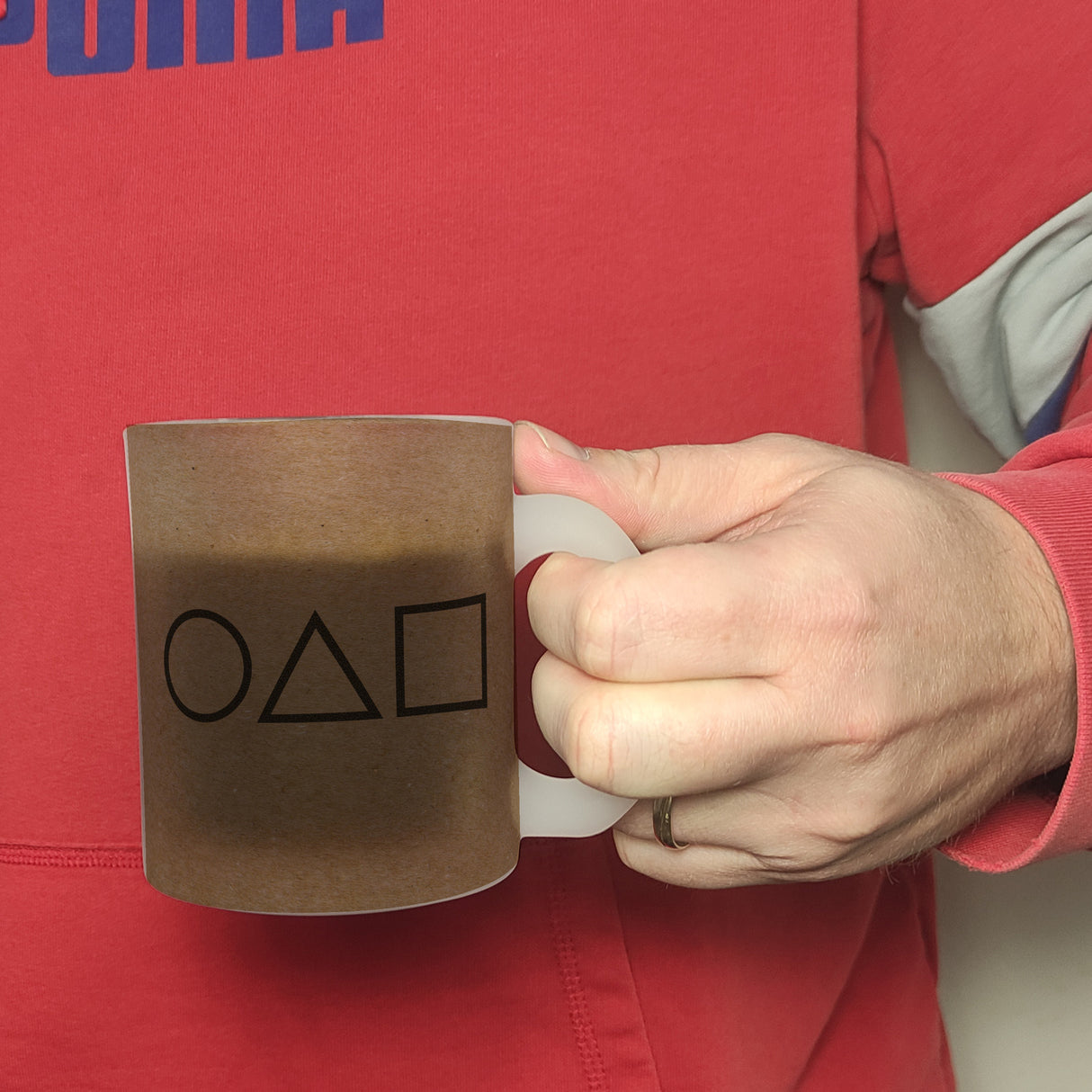 Kaffeebecher mit Serienmotiv Tintenfisch Kreis Dreieck Viereck Südkorea