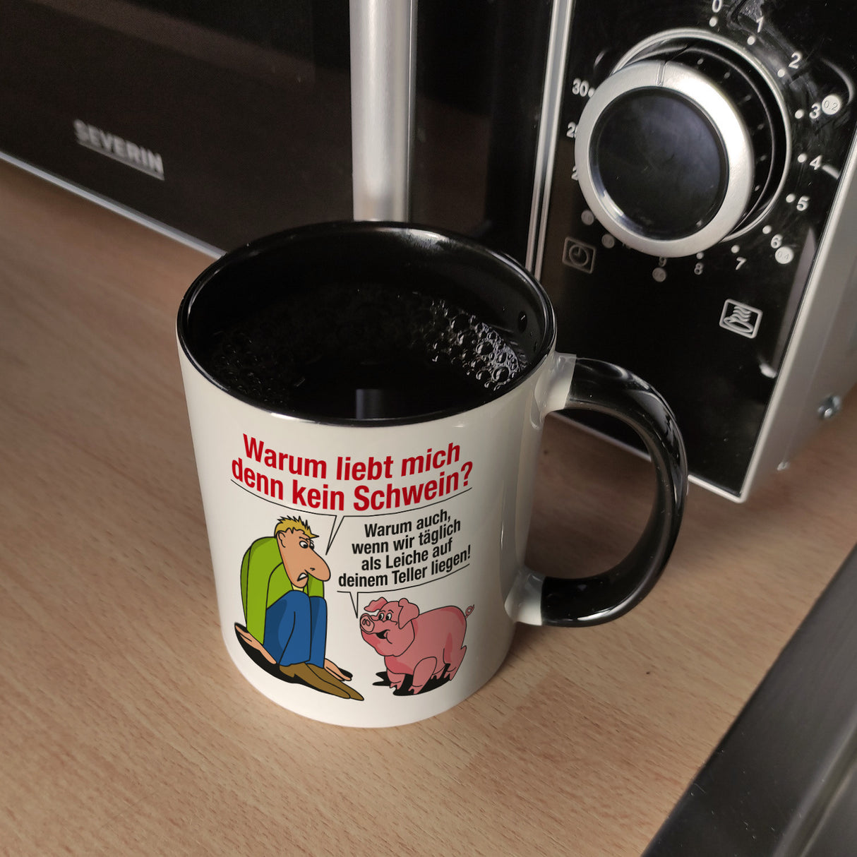 Kaffeebecher zum Thema Fleischesser und Vegetarier mit Schweine Motiv