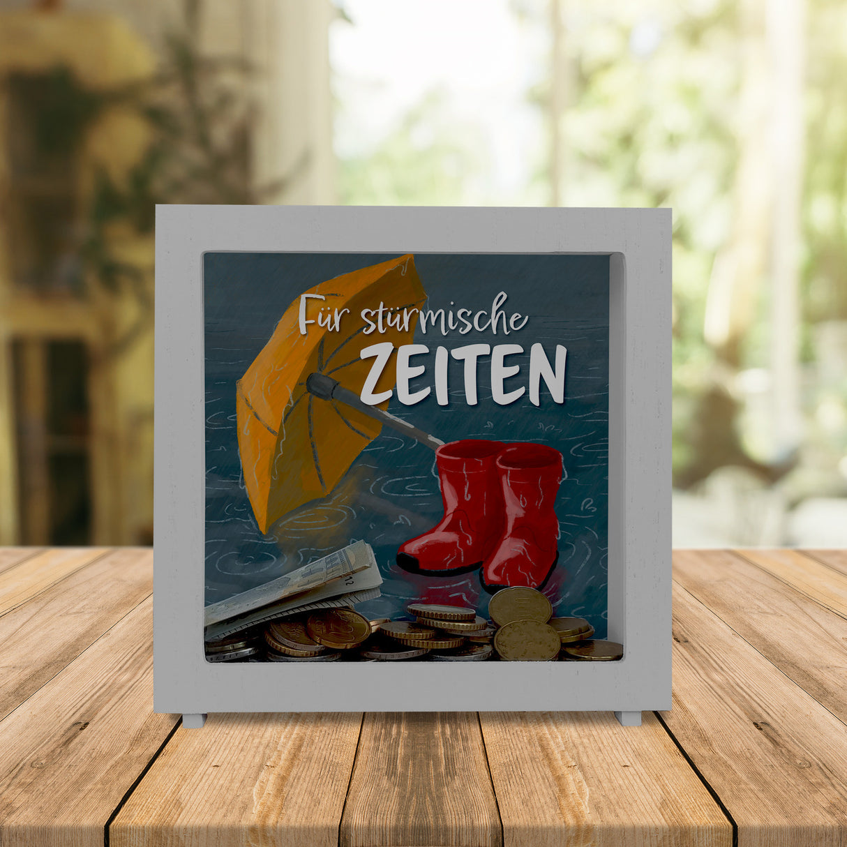 Für stürmische Zeiten Spardose mit Regen Motiv