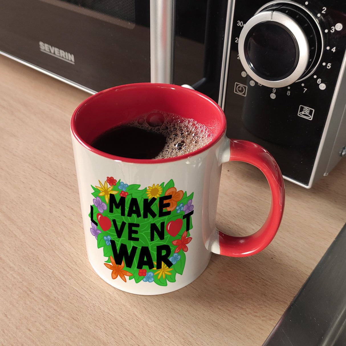 Make love not war Blumenmotiv Kaffeebecher