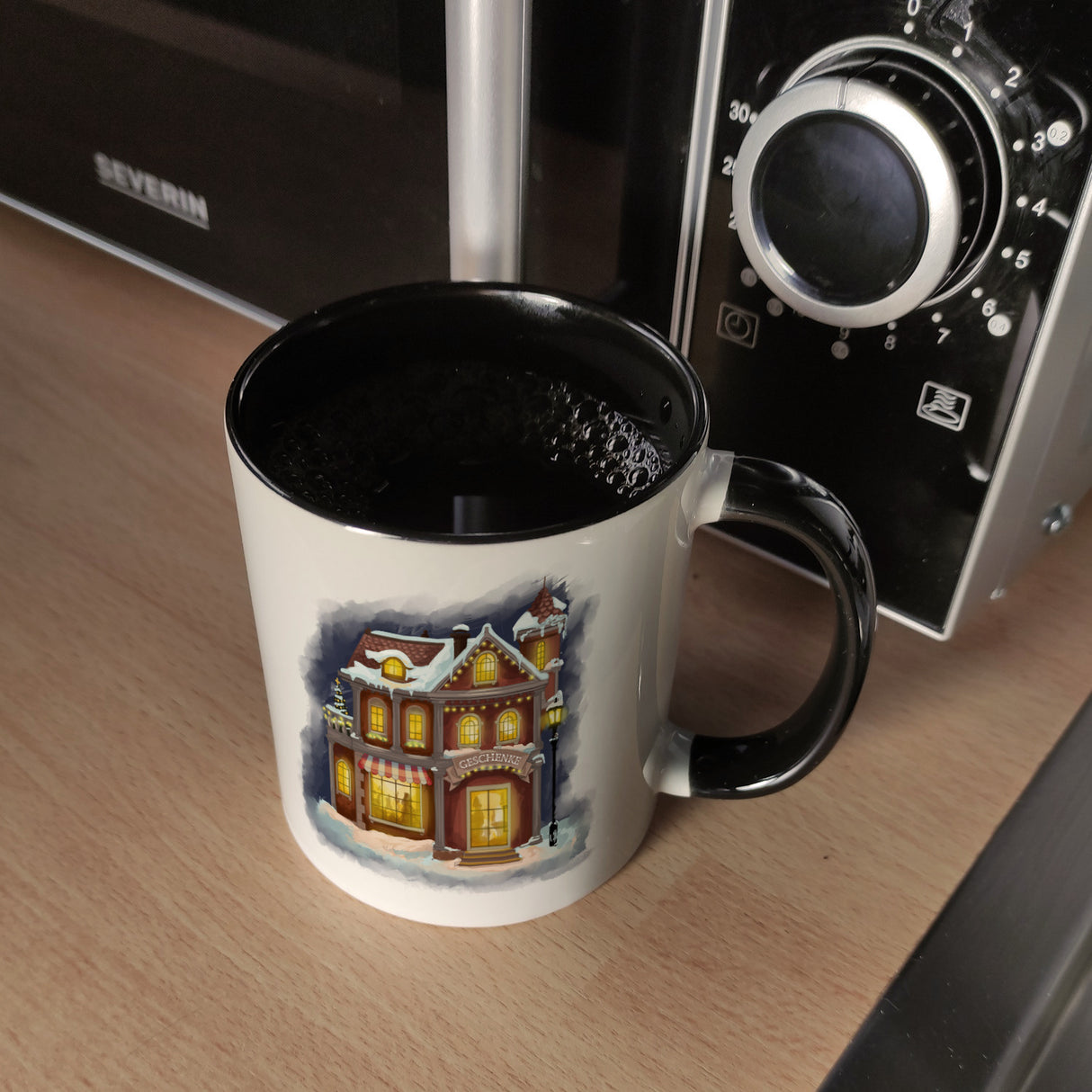 Geschenkeladen Weihnachtsmotiv Kaffeebecher