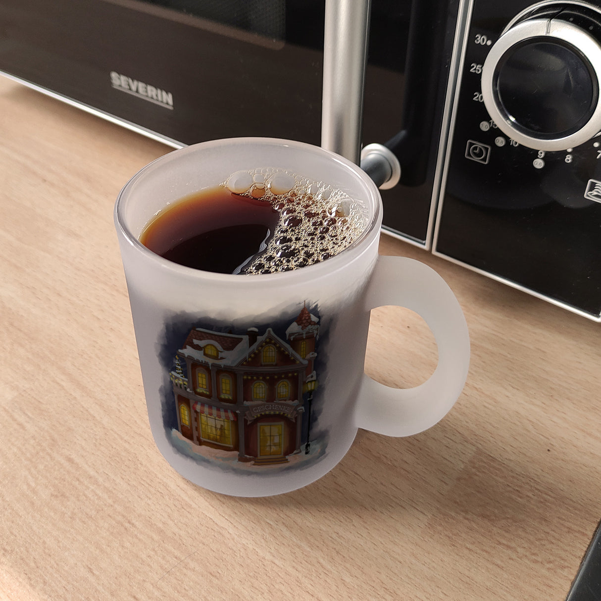 Geschenkeladen Weihnachtsmotiv Kaffeebecher