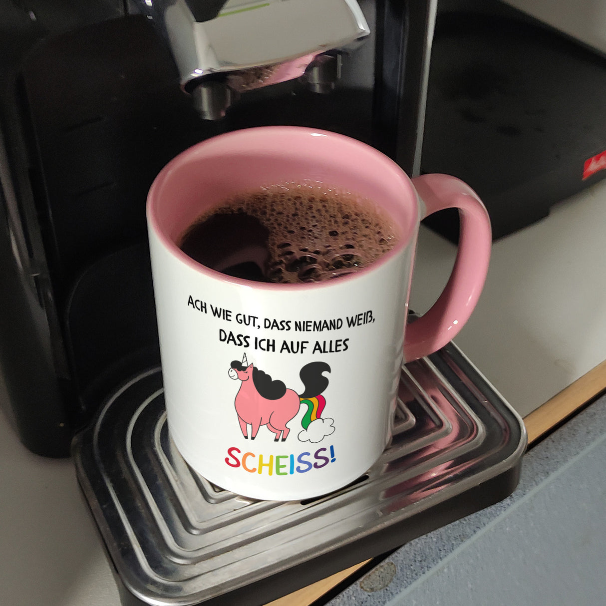 Einhorn Kaffeebecher mit Spruch Ach wie gut, dass niemand weiß