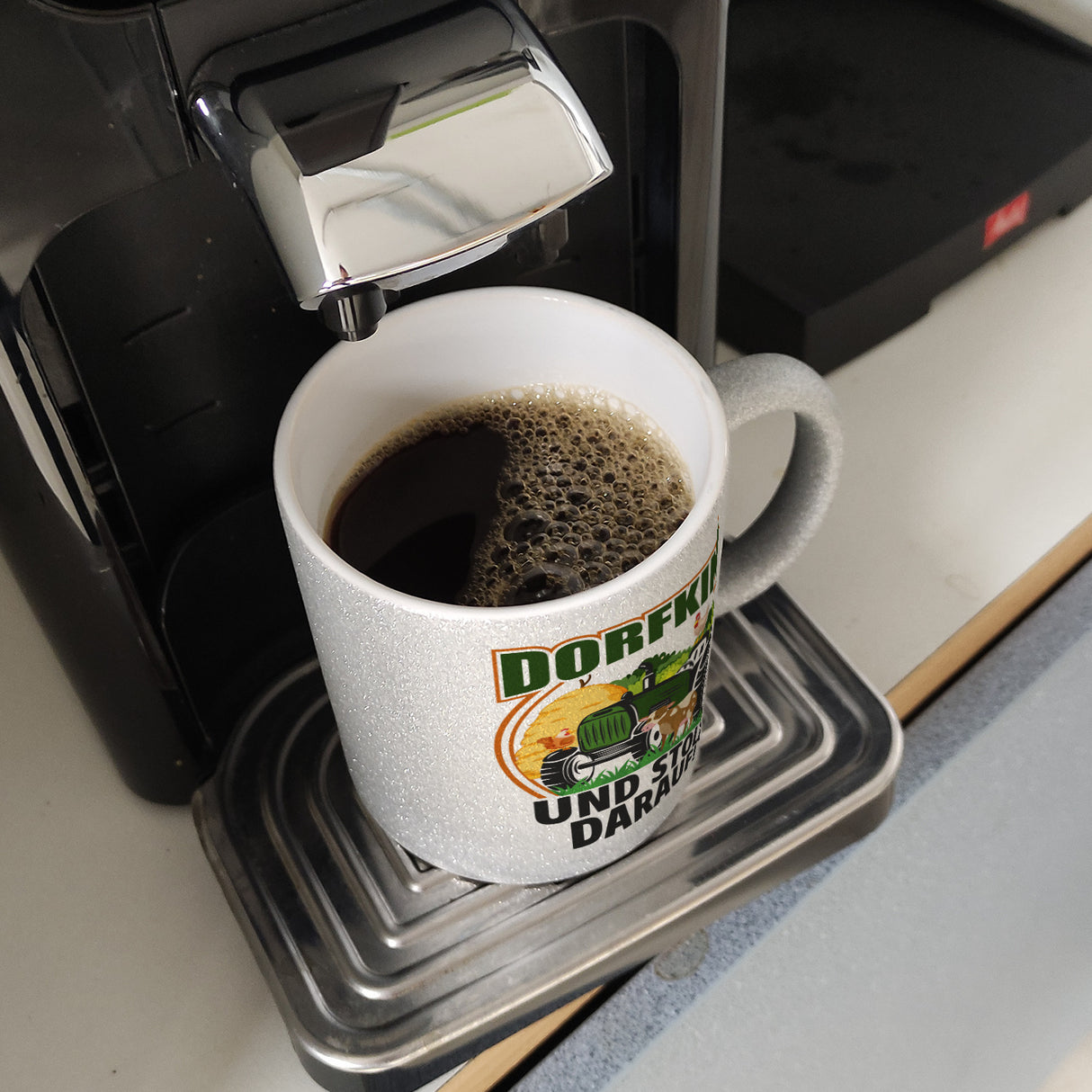 Dorf Kaffeebecher mit Spruch Dorfkind und stolz darauf