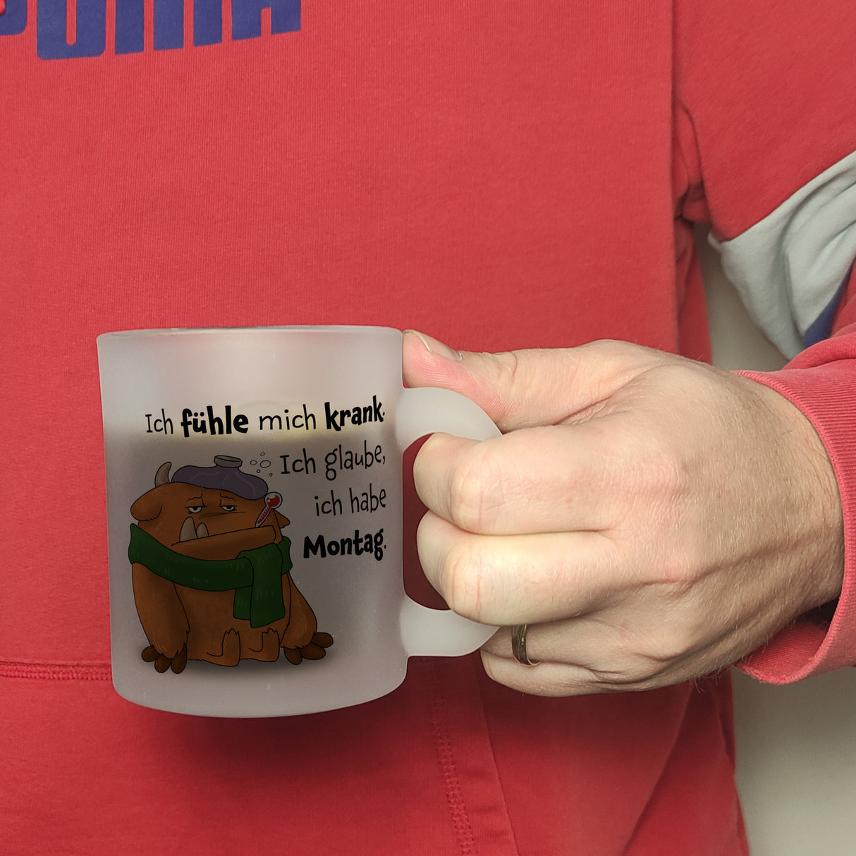 Freches Monster in orange Kaffeebecher mit lustigem Spruch