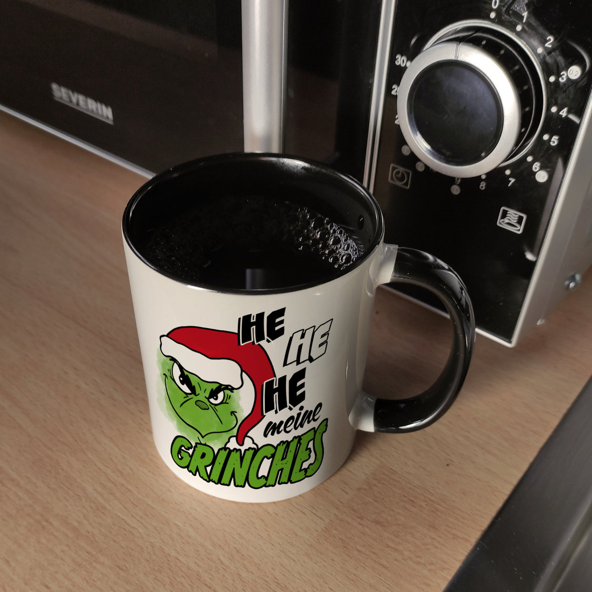 Weihnachtsmuffel Kaffeebecher mit Spruch He he he meine Grinches