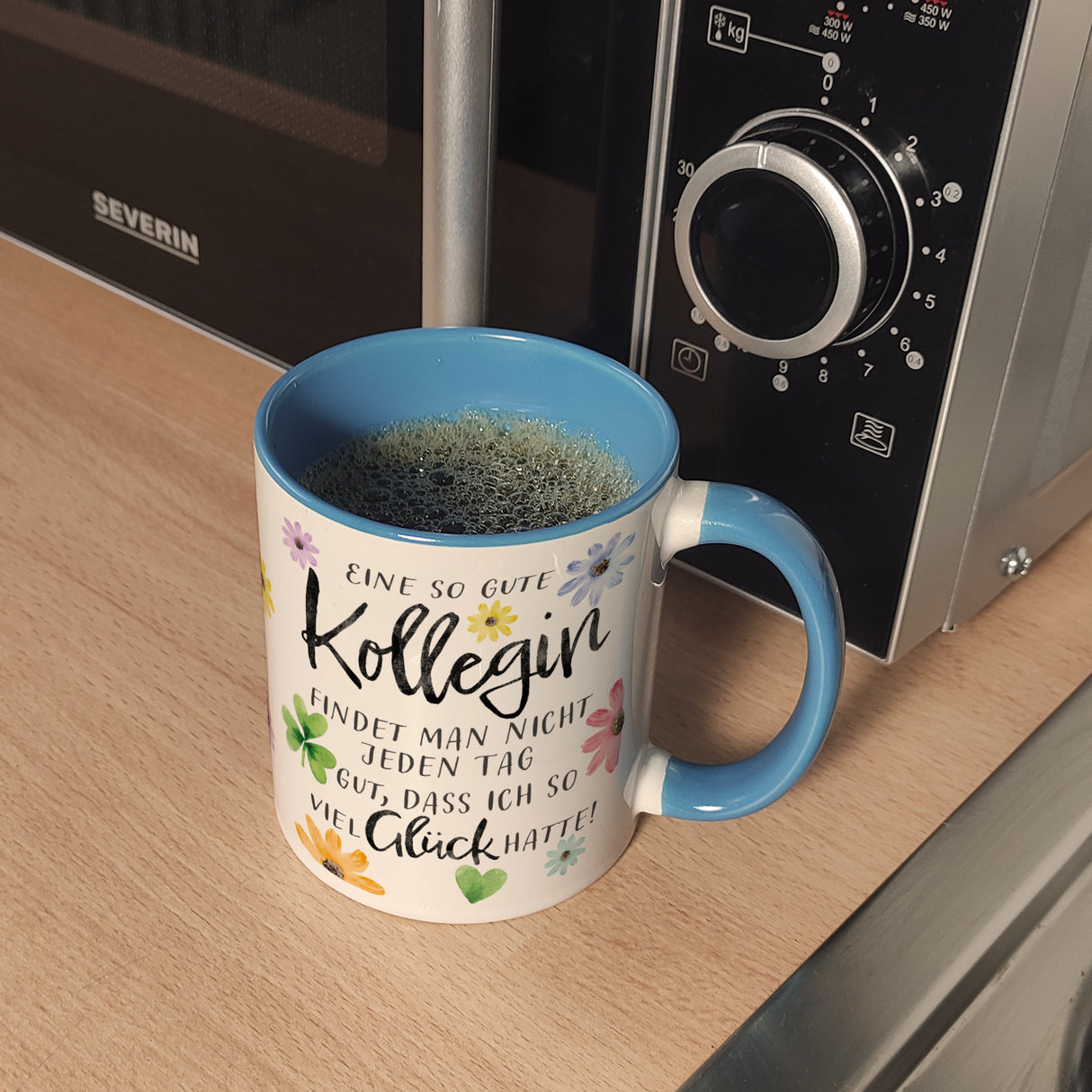 Blumen Kaffeebecher mit Spruch Glück gehabt mit toller Kollegin
