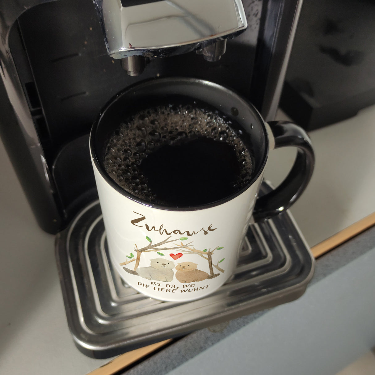 Biber Kaffeebecher mit Spruch Zuhause ist da wo die Liebe wohnt