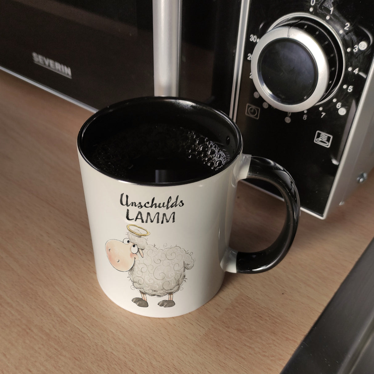 Schaf Kaffeebecher mit Spruch Unschuldslamm