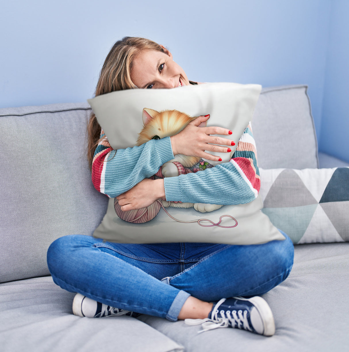Katzenbaby mit Wollknäuel Kissen