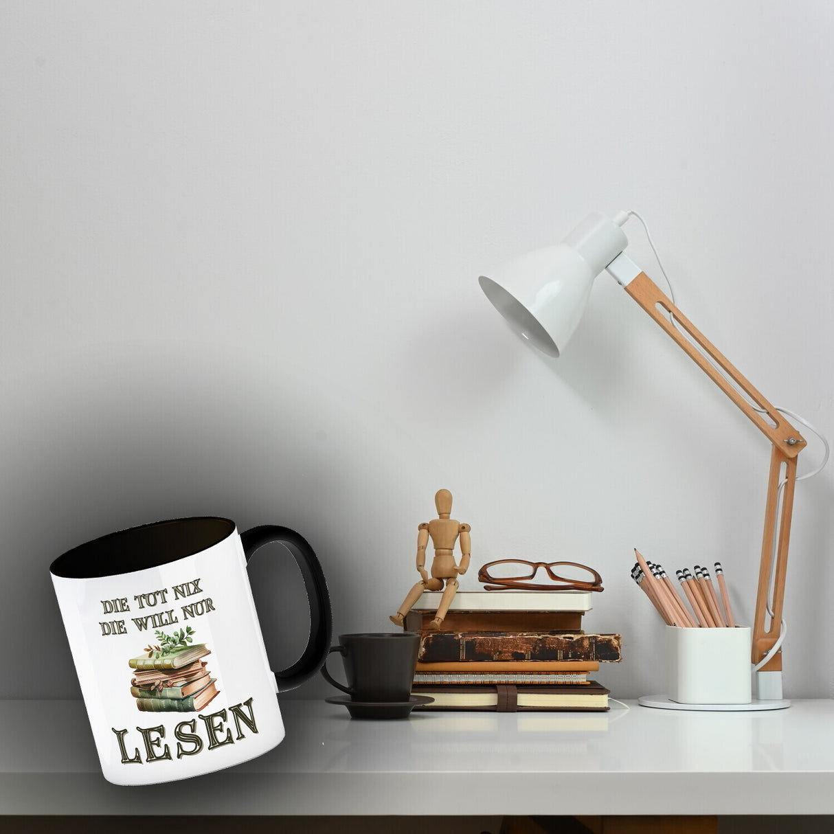 Bücher Kaffeebecher mit Spruch Die tut nix die will nur lesen