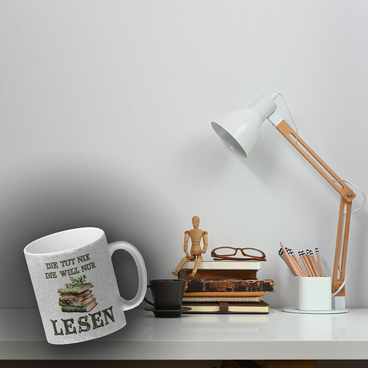 Bücher Kaffeebecher mit Spruch Die tut nix die will nur lesen