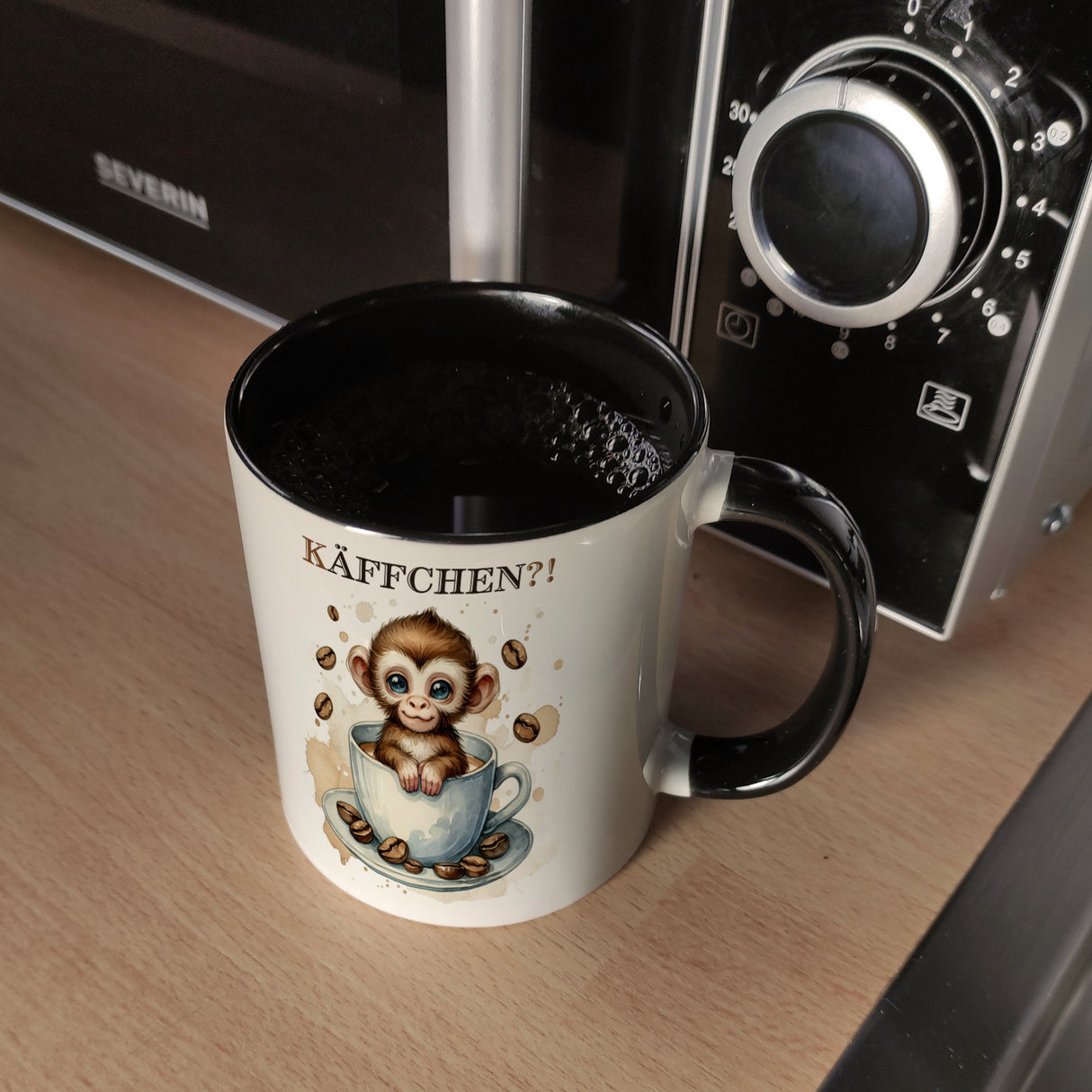 Käffchen Süßer Affe in einer Kaffeetasse Kaffeebecher