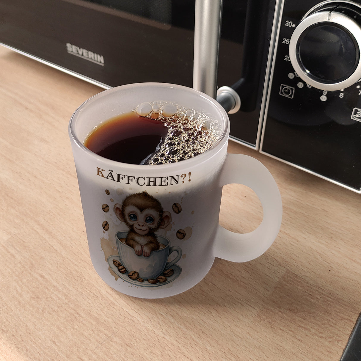 Käffchen Süßer Affe in einer Kaffeetasse Kaffeebecher