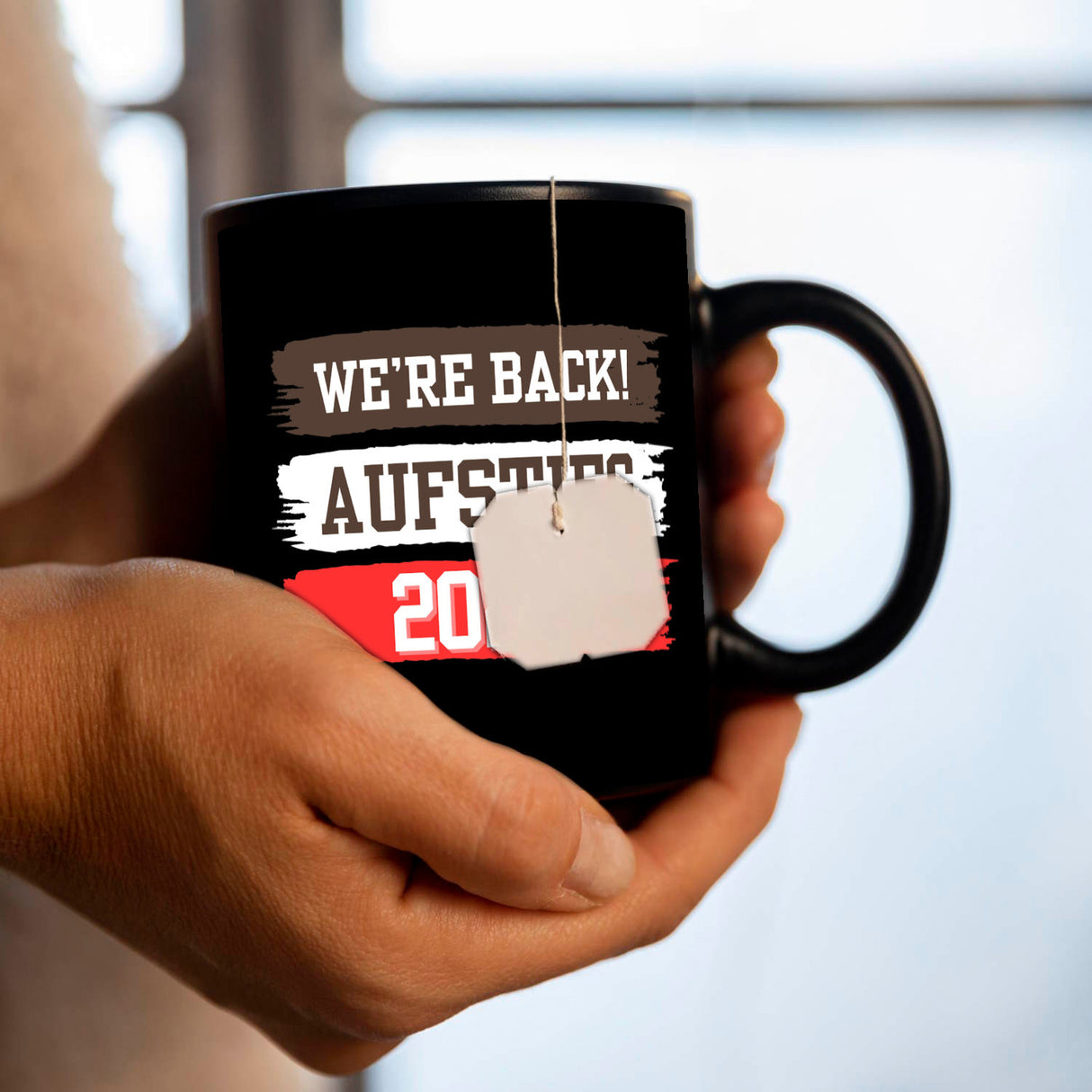 St. Pauli Aufstieg 2024 Tasse in Schwarz mit Spruch We're back