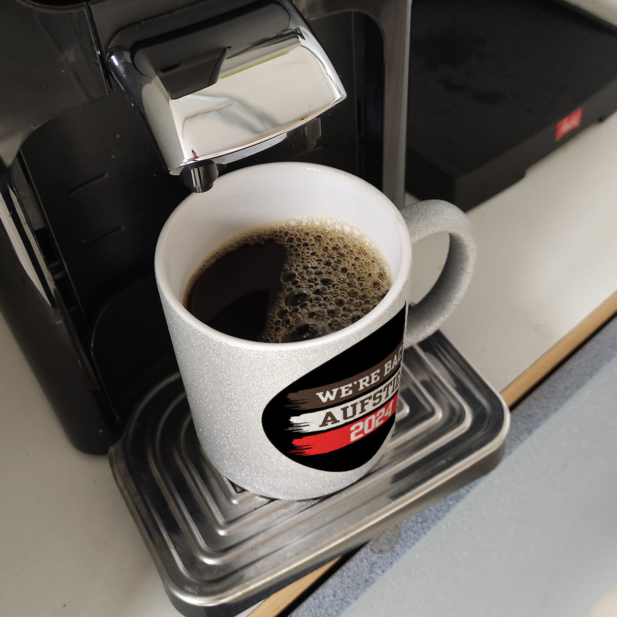 St. Pauli Aufstieg 2024 Kaffeebecher mit Spruch We're back