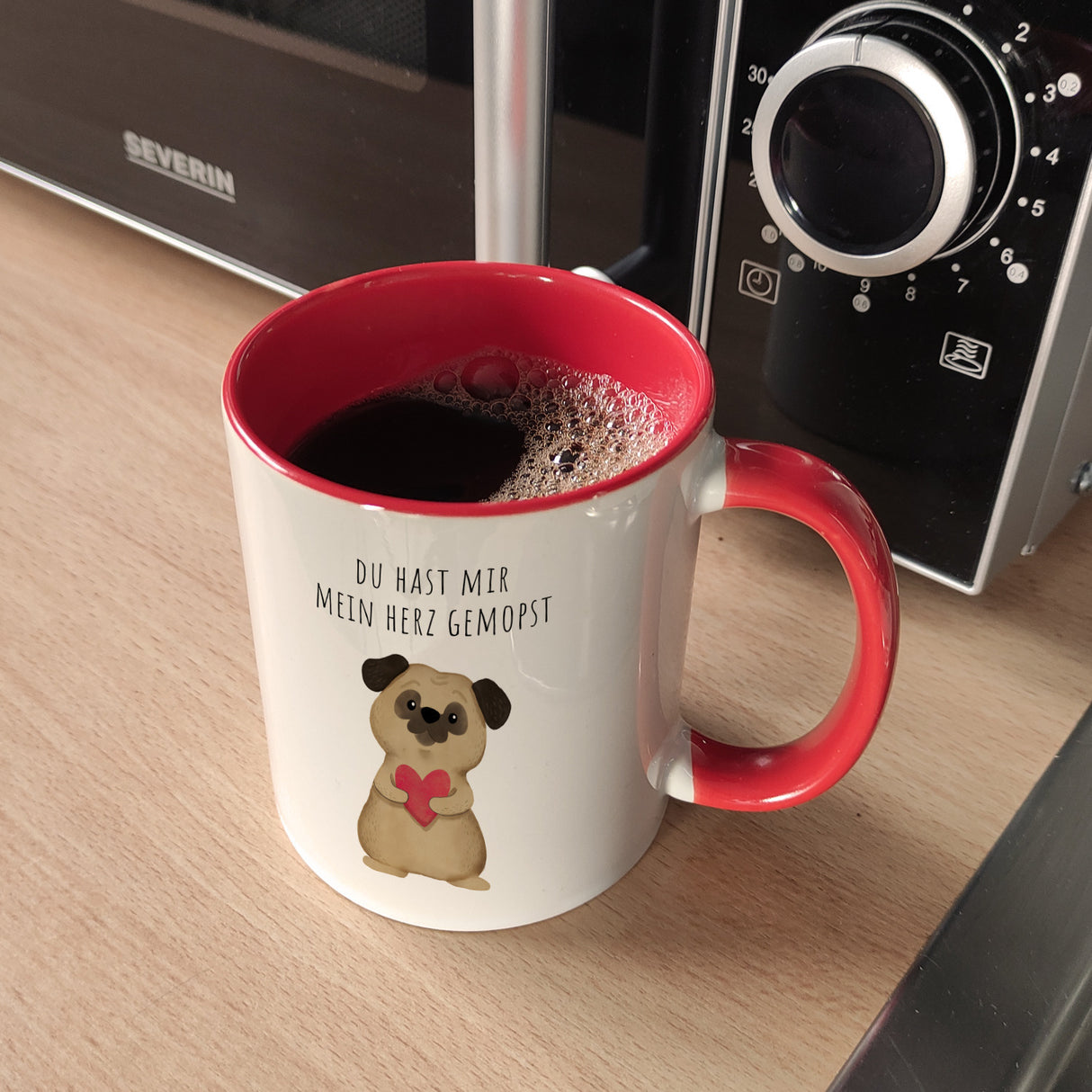 Mops mit Herz Kaffeebecher mit Spruch Du hast mir mein Herz gemopst
