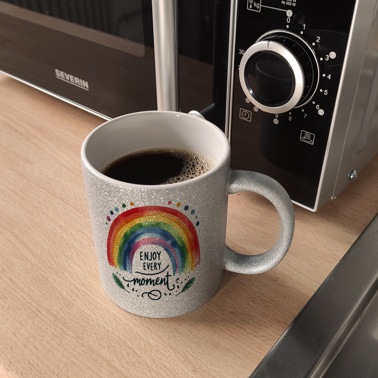 Regenbogen Kaffeebecher mit Spruch Enjoy every moment