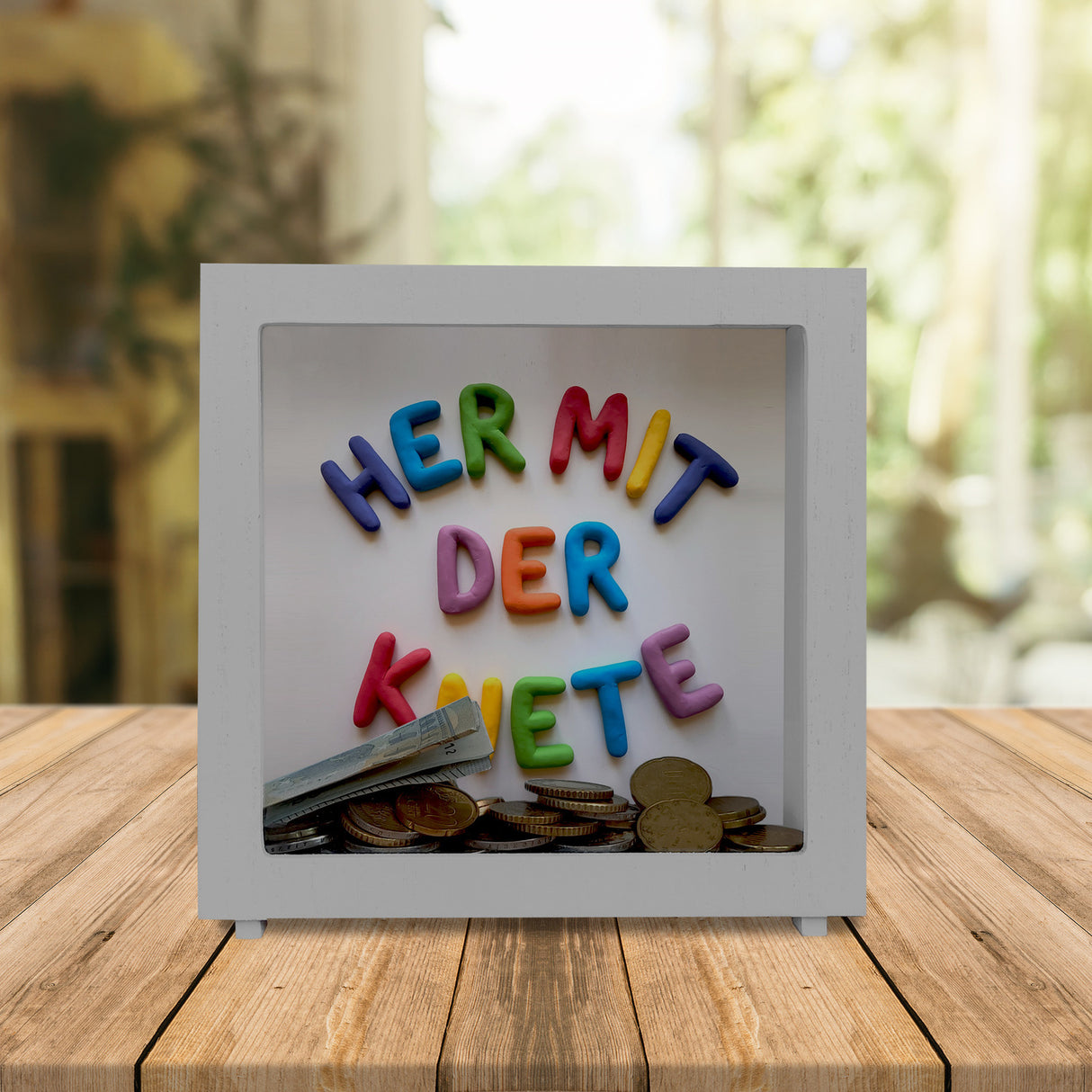 Her mit der Knete Spardose