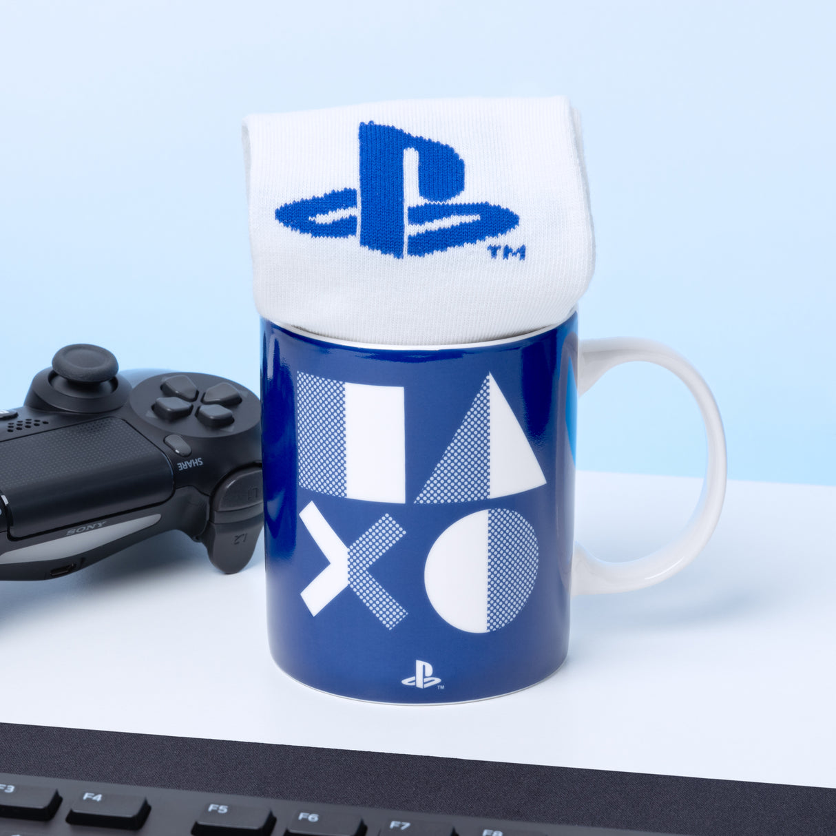 PlayStation Icons Kaffeebecher mit Socken