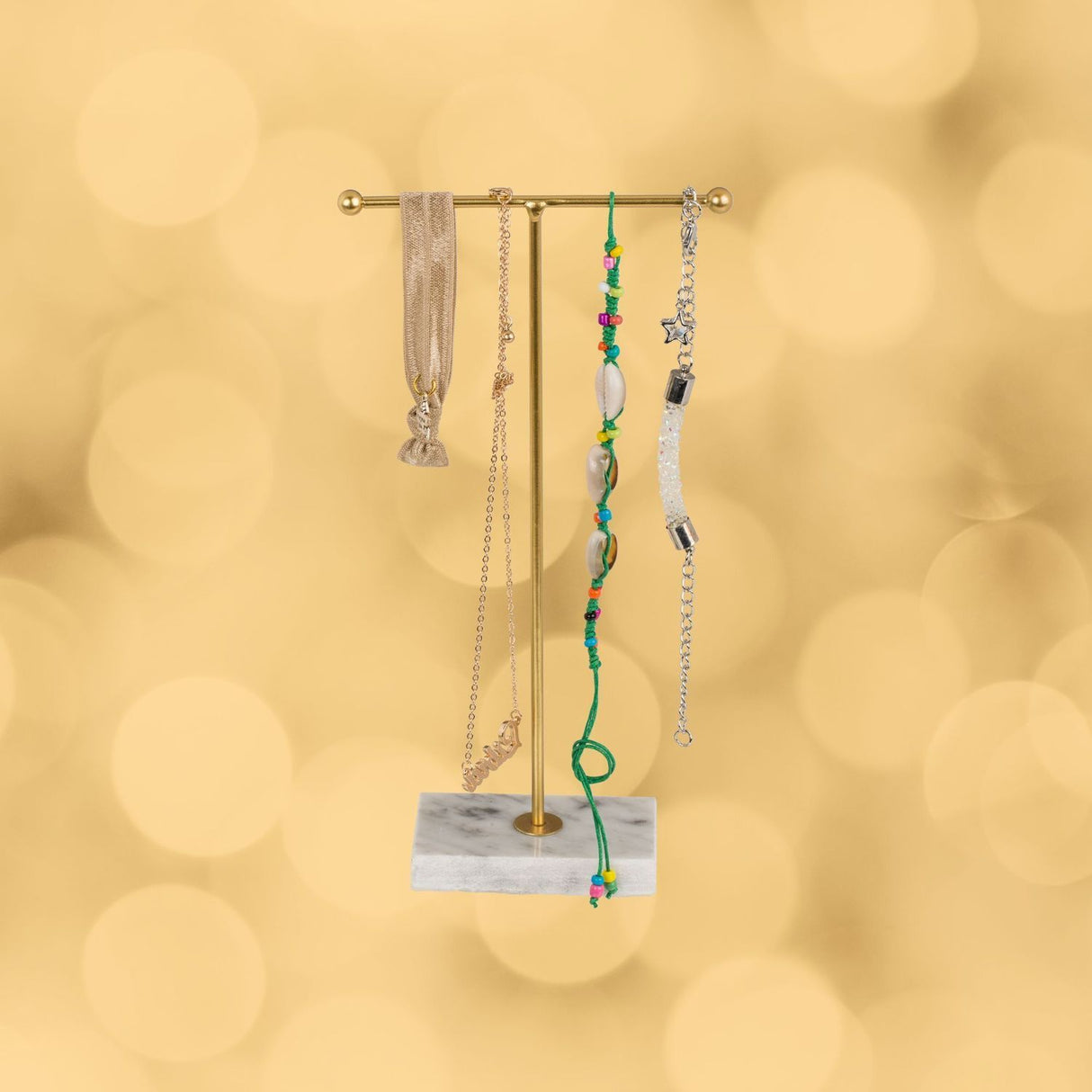 T-Form Schmuckhalter in gold mit Marmorsockel