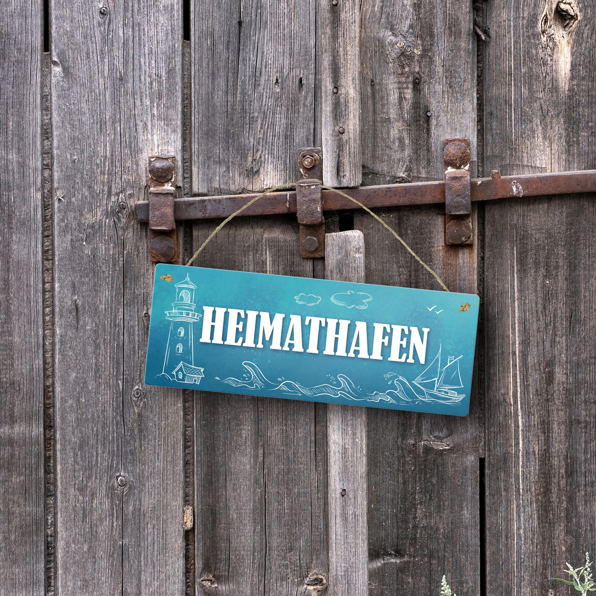 Metallschild mit maritimen Motiv und Spruch: Heimathafen