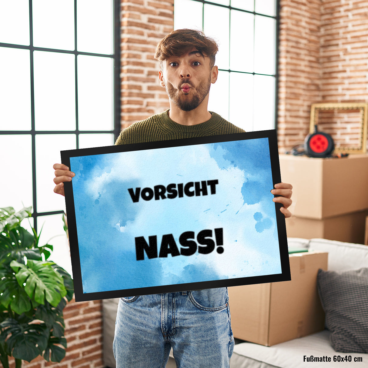 Vorsicht Nass! Fussmatte mit Tropfen oder Wasserpfütze