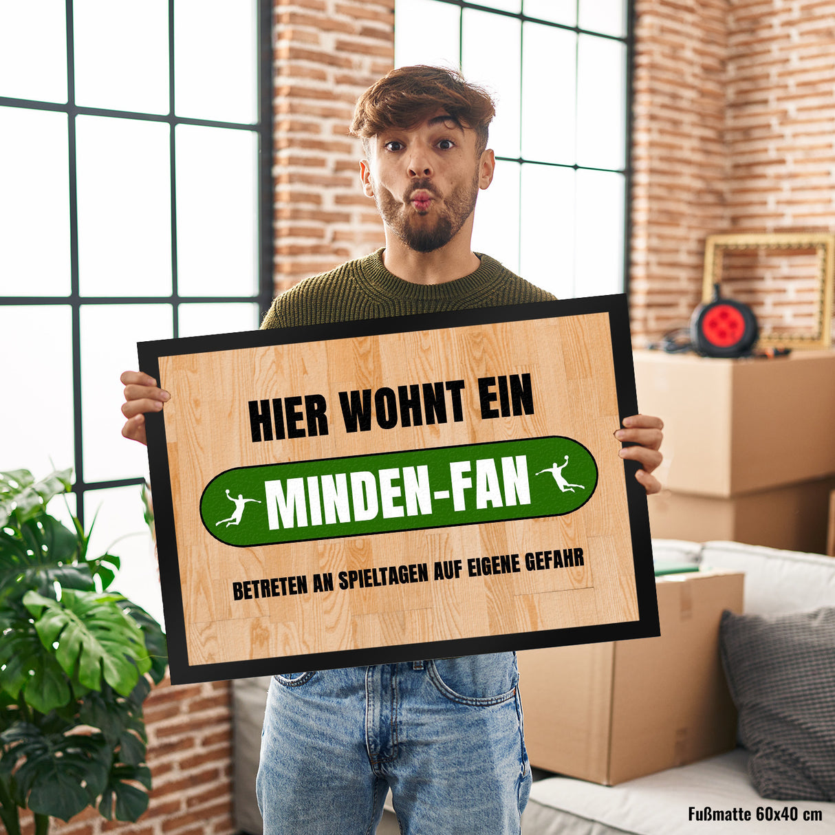 Hier wohnt ein Minden-Fan Fußmatte in 35x50 cm mit Turnhallenboden Motiv