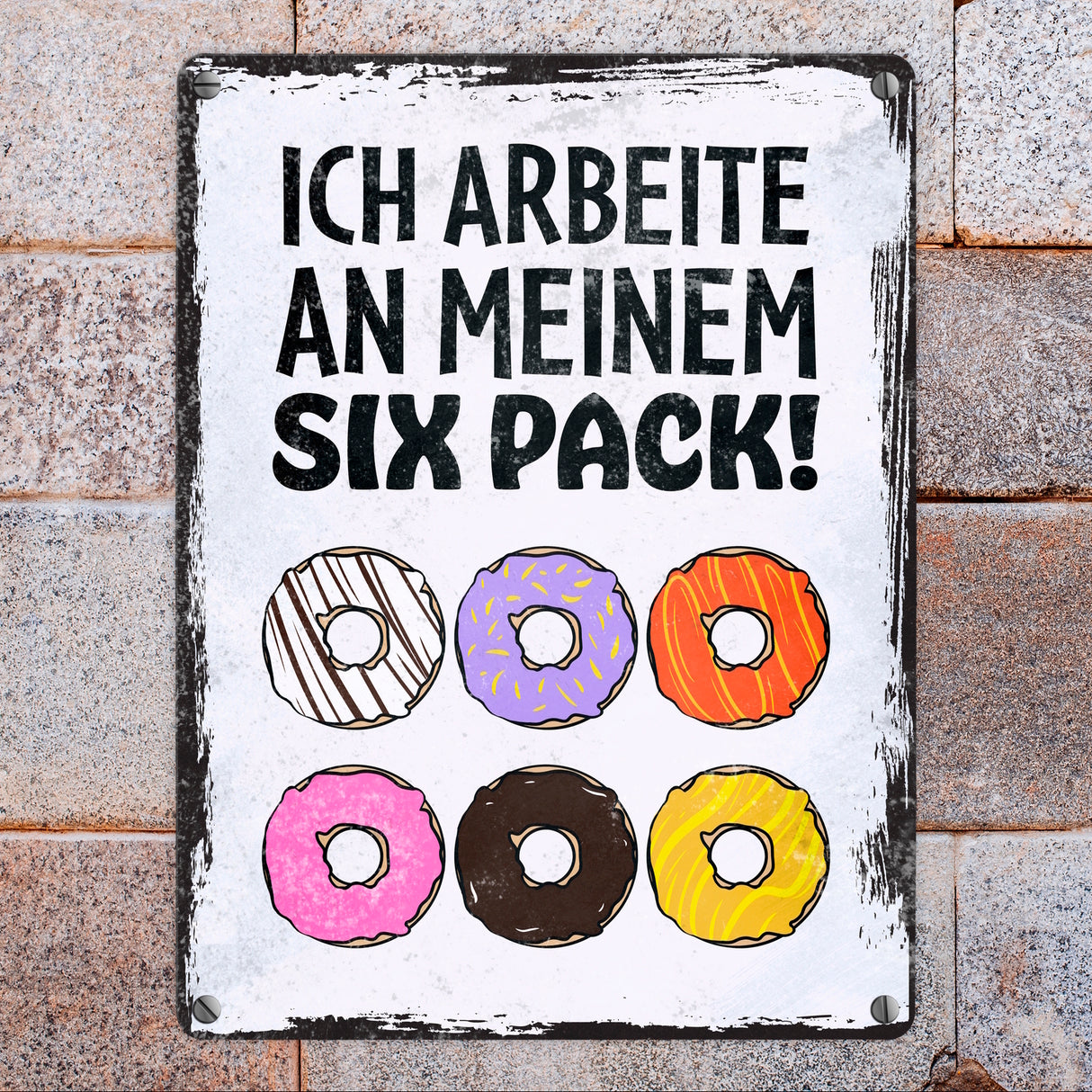 Ich arbeite an meinem Six Pack Metallschild mit leckeren Donuts