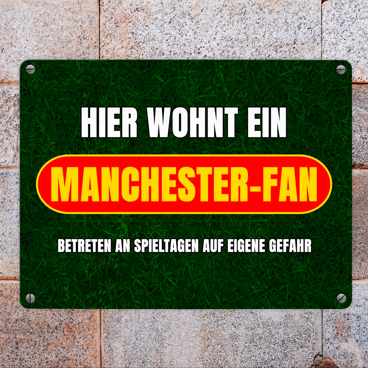 Hier wohnt ein Manchester-Fan Metallschild in 15x20 cm mit Rasenmotiv