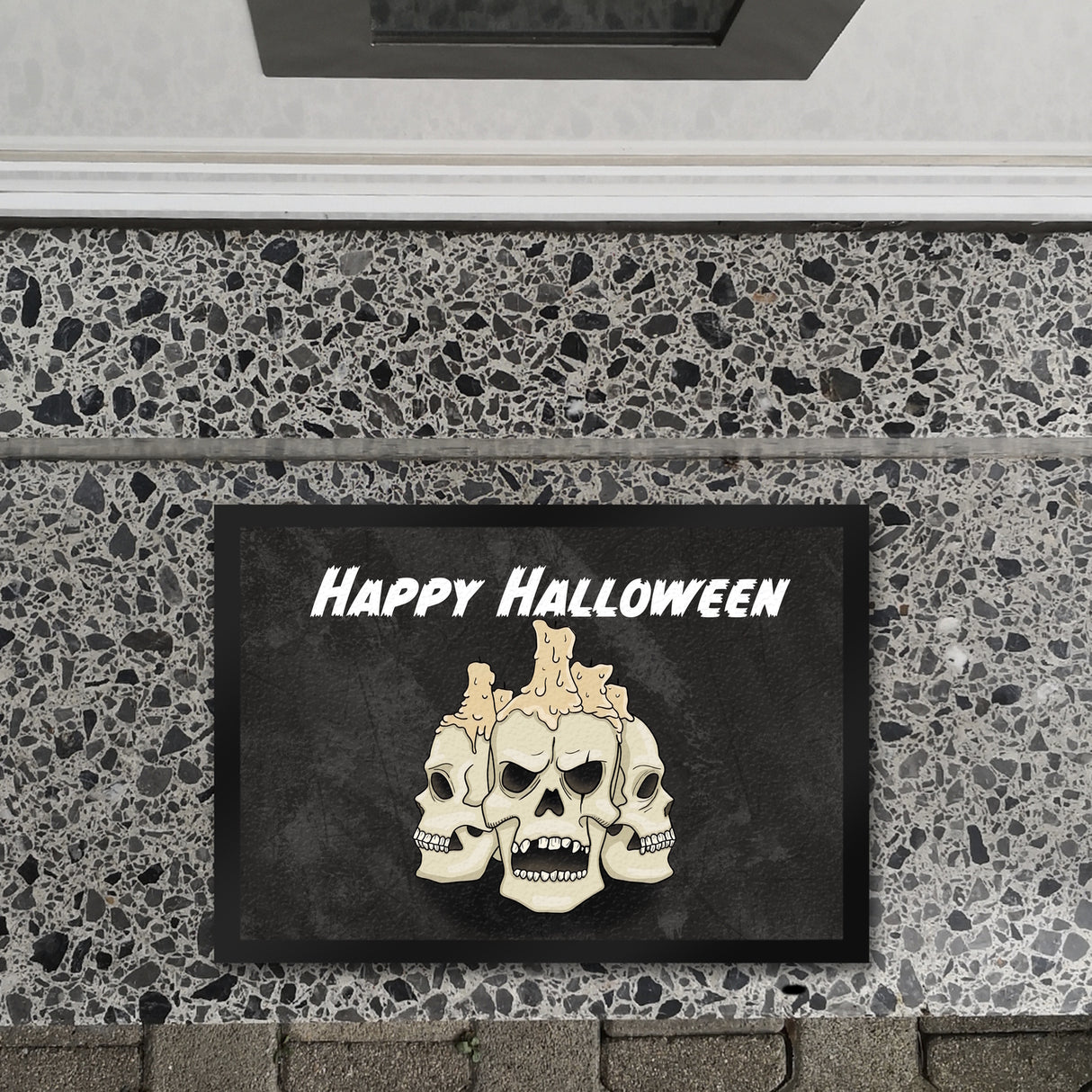 Fußmatte für Halloween mit Totenköpfen und Kerzen - Happy Halloween