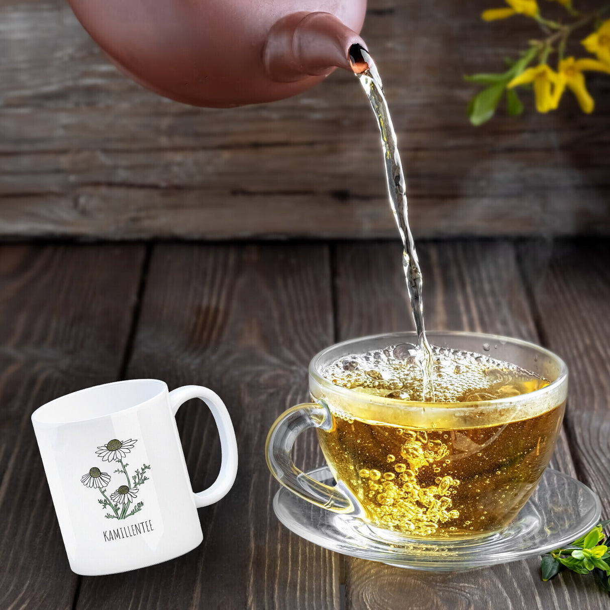 Kamillentee Teetasse mit Kamillenblüte für Teetrinker