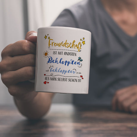 Kaffeebecher mit lustigem Spruch zu Freundschaft