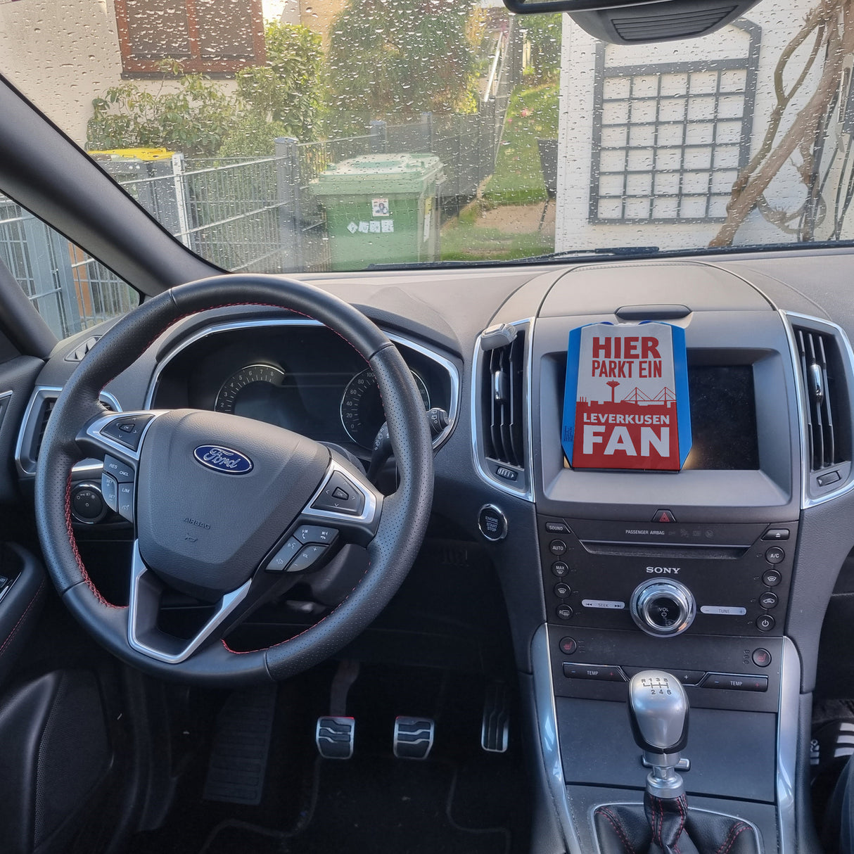 Hier parkt ein Leverkusen Fan Parkscheibe in Rot Weiß