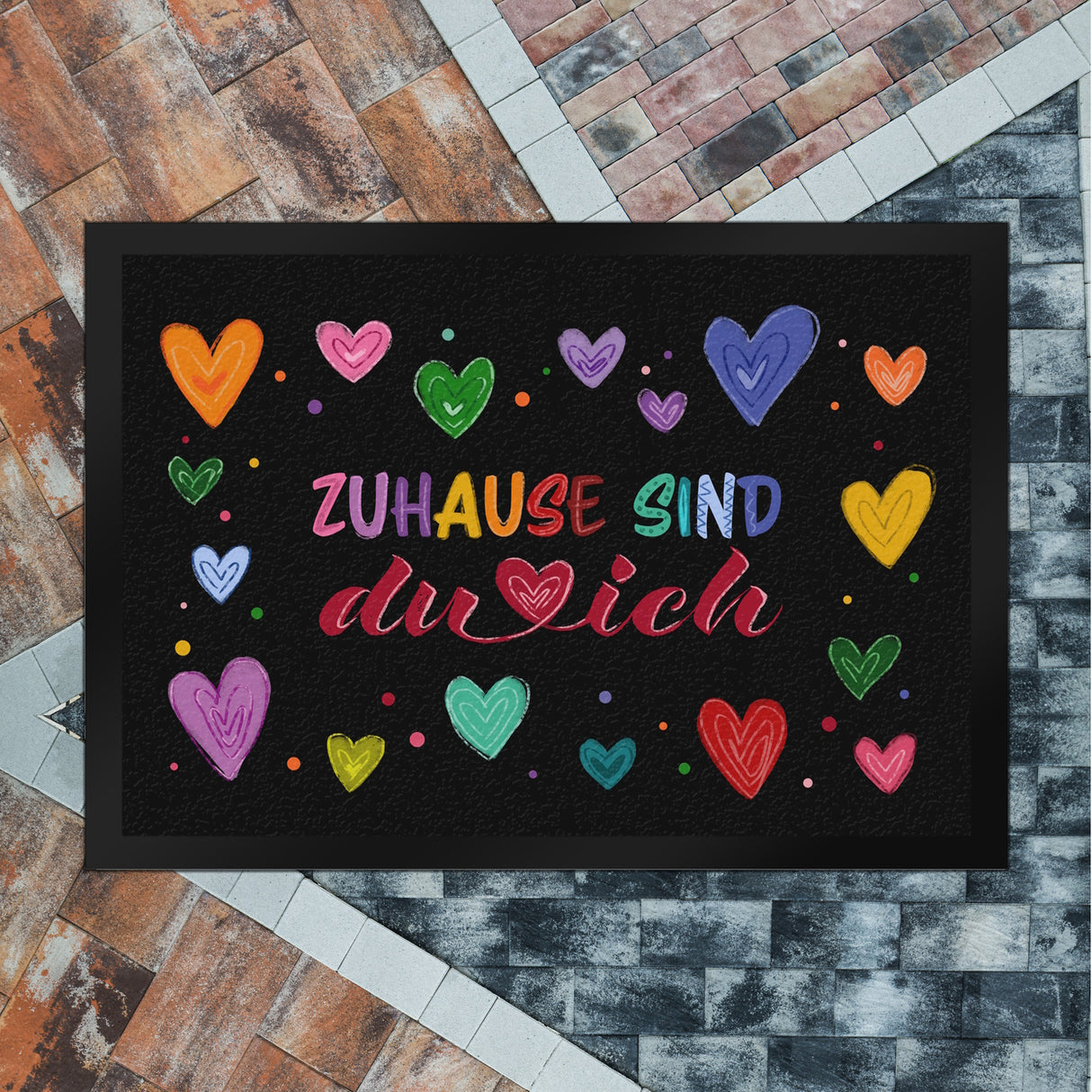 Zuhause sind du und ich Fußmatte mit bunten Herzen