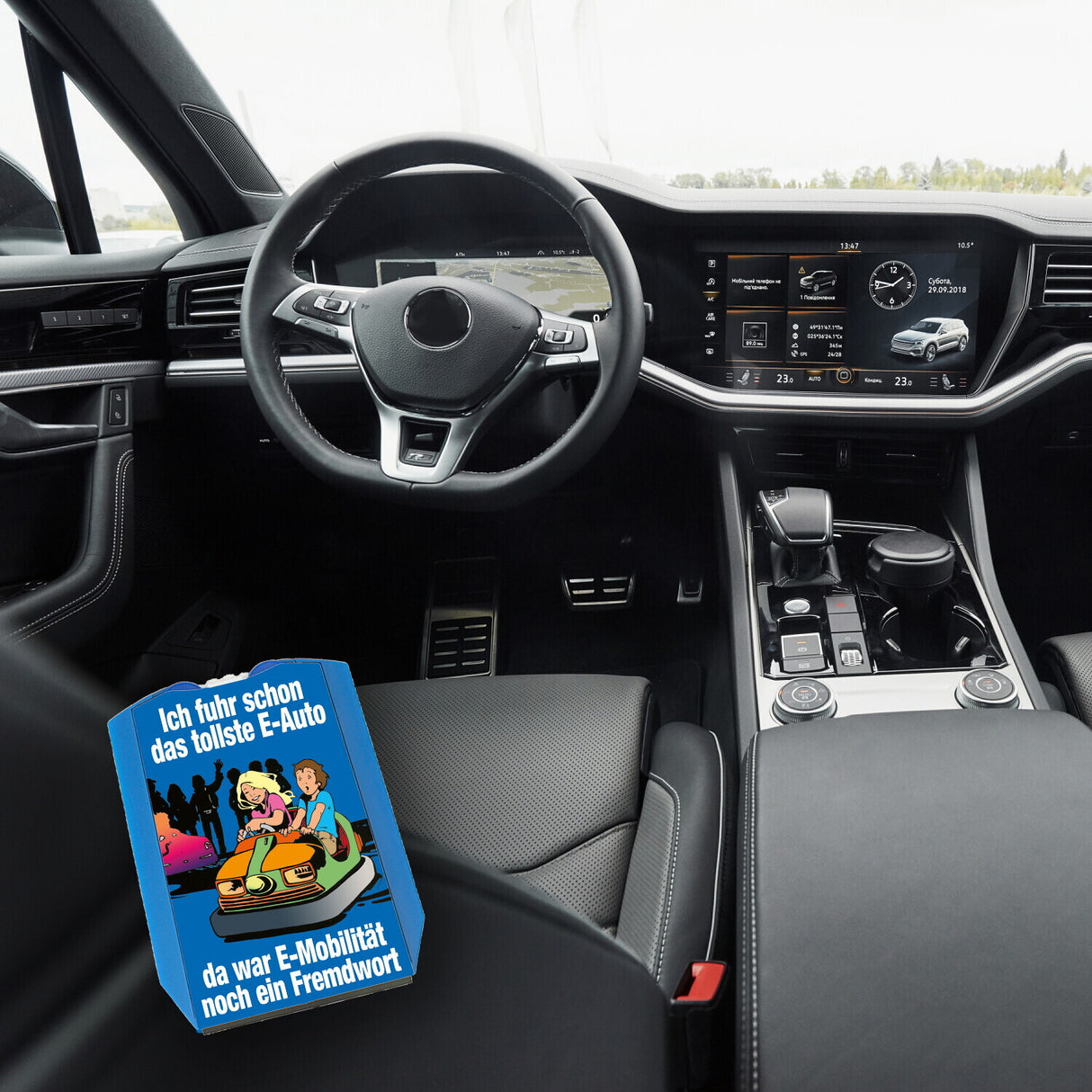 Boxauto als E-Auto Parkscheibe mit Spruch zu E-Mobilität in blau