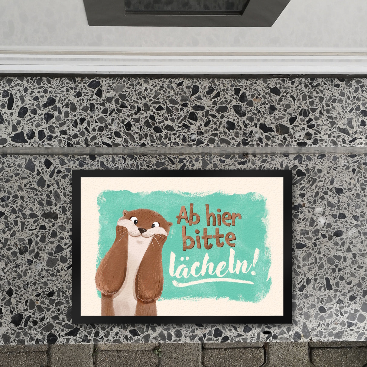 Lachender Otter Fußmatte in 35x50 cm mit Spruch Ab hier bitte lächeln