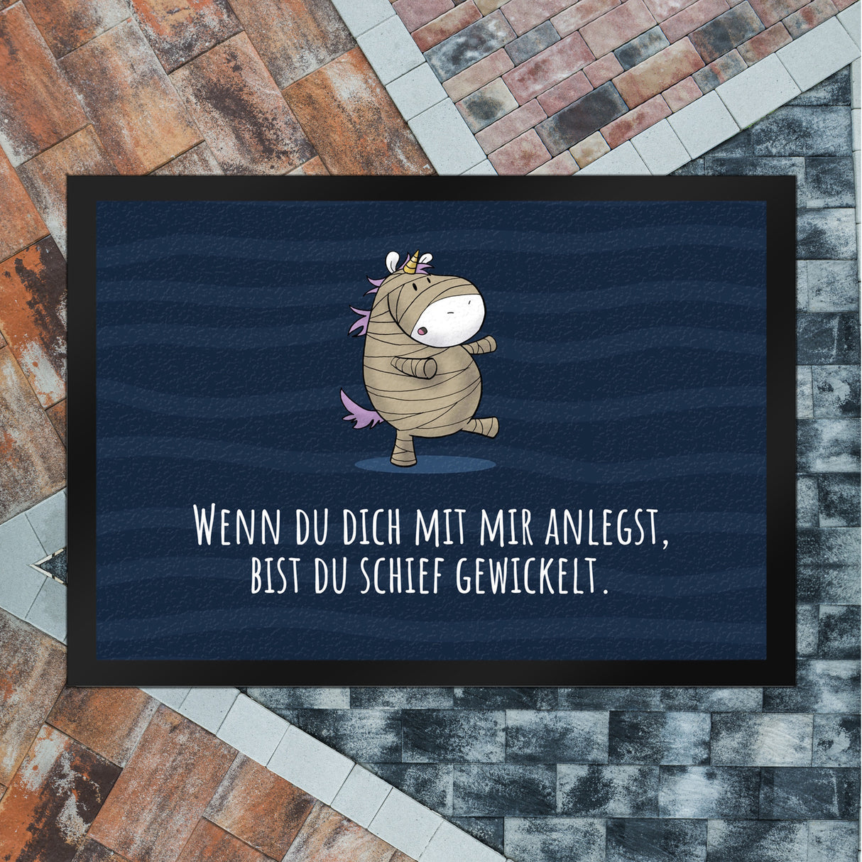 Einhorn-Mumie Fußmatte in 35x50 cm mit Spruch Du bist schief gewickelt