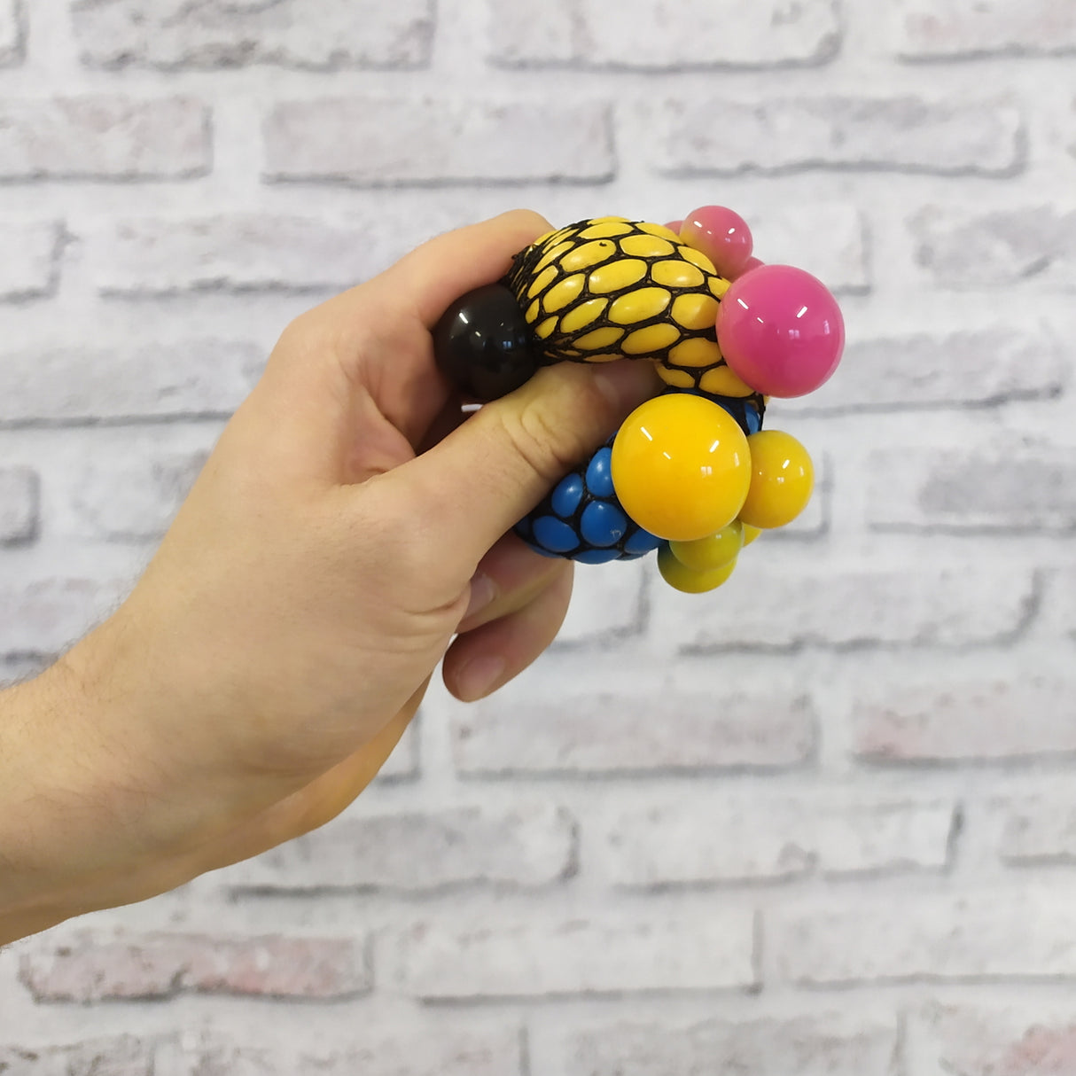 Doppel Netz Stressball in blau-gelb