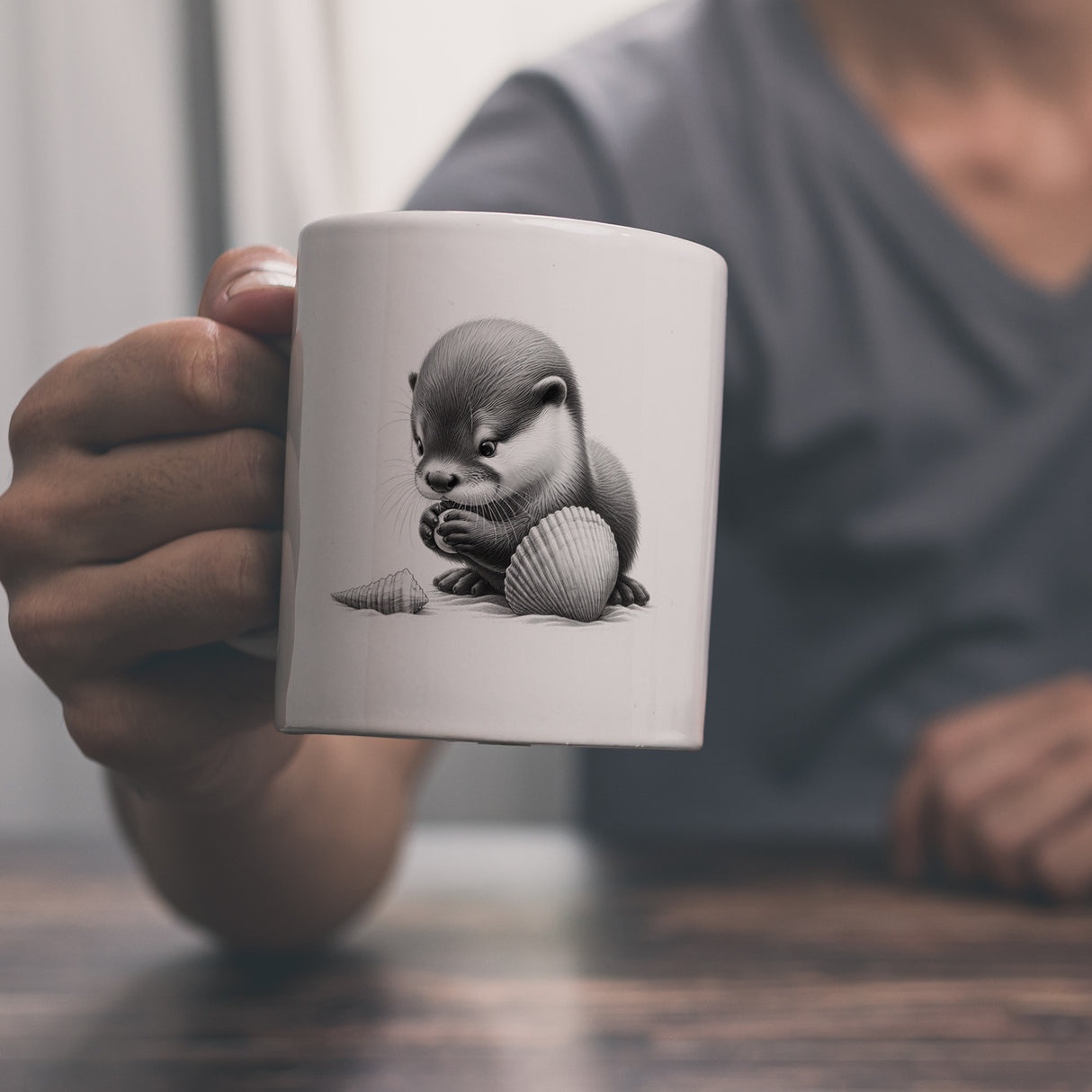 Baby Otter mit Muschel Kaffeebecher